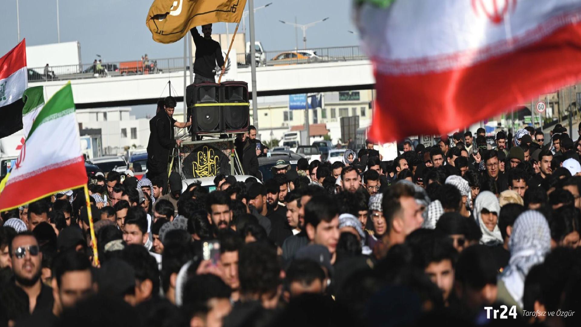 Bağdat’ta binlerce Iraklı, ABD ve İsrail’in İran’a yönelik saldırılarını protesto etti